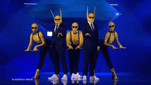 People in Suits and Masks Dancing Norway
