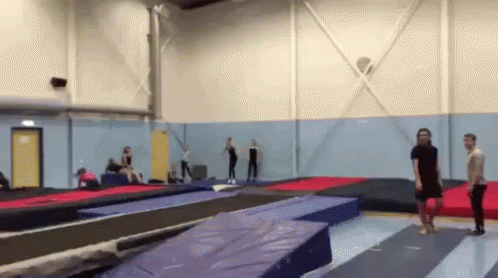 People Jumping on Trampolines