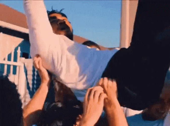 People Lifting Guy In Mosh Pit GIF