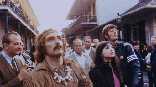 People Looking Up On Street GIF