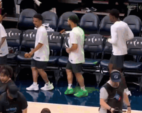 People On Basketball Court With Thirty Chairs GIF