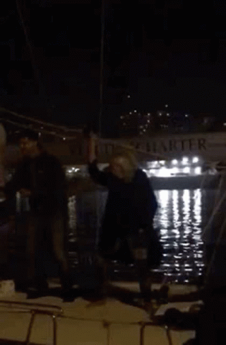 People on Boat With Ruta Sign