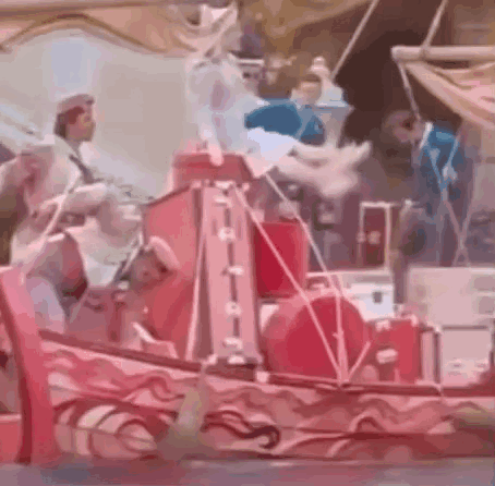 People on Red Boat in Parade