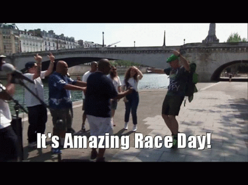 People on Sidewalk It's Amazing Race Day