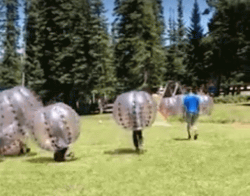 People Playing Bubble Football