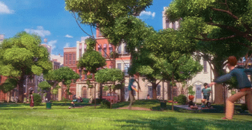 People Playing Frisbee Near Building With A