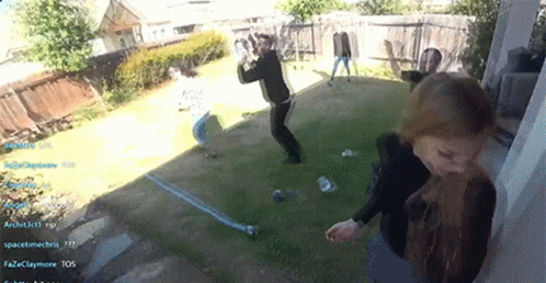 People Playing Game in Backyard Spacetimechris