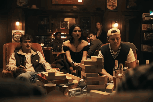 People Playing Jenga in Bar