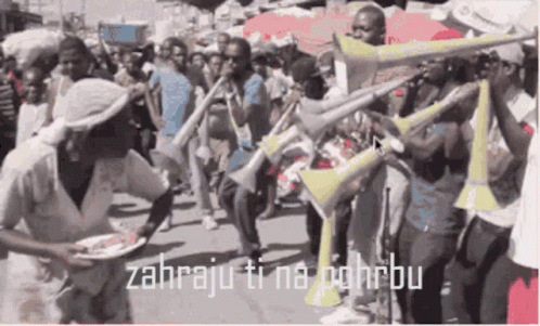 People Playing Trumpets Saying Zahraju Ti Na Pahru GIF