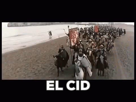 People Riding Horses on Beach