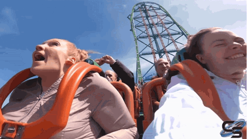 People Riding Roller Coaster with SS