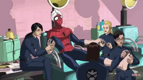 People Sitting Around Man in Spider-Man Costume