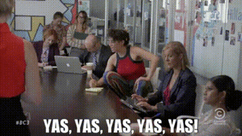 People Sitting Around Table Yelling