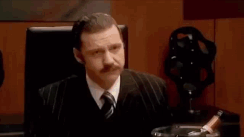 People Sitting At Conference Table Having Meeting GIF