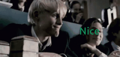 People Sitting in Lecture Hall with Nice in Green