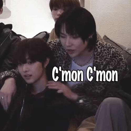 People Sitting on Couch With C'mon C'mon