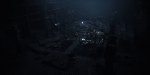 People Standing Around Table in Dark Room