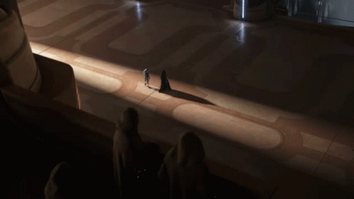 People Standing in Dark Room with Shadow
