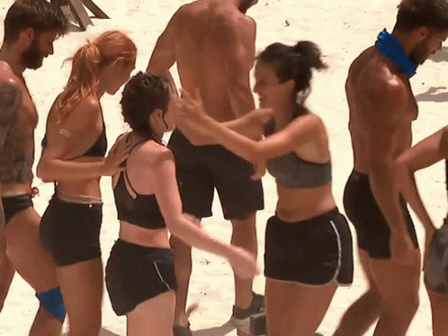 People Standing on Beach with Bandana