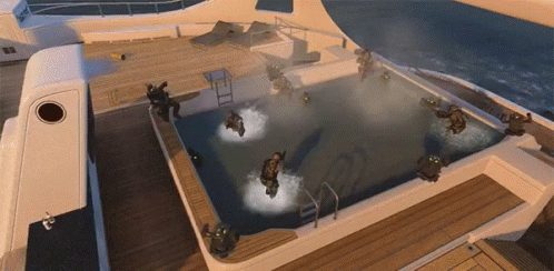 People Swimming in Large Pool