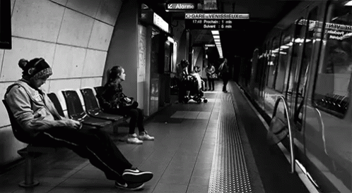 People Waiting For Train At Station GIF