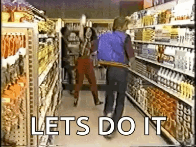 People Walking Down Grocery Aisle Let's Do It