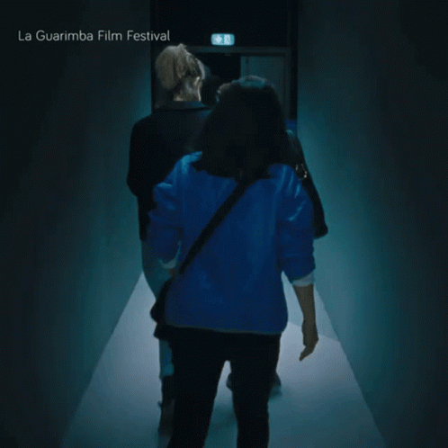People Walking Down Hallway La Guarimba Film Festival