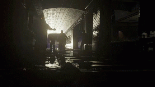 People Walking In Black And White Tunnel GIF