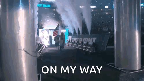People Walking Through Tunnel On My Way GIF
