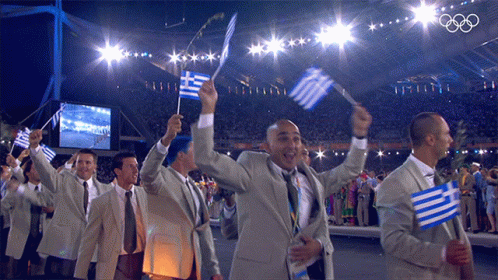 People Waving Small Flags Of Greece At Olympic GIF