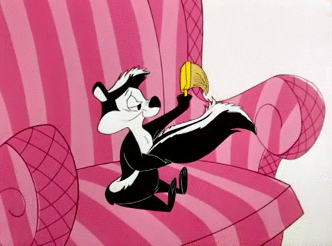 Pepe Le Pew Combing Tail Hair GIF