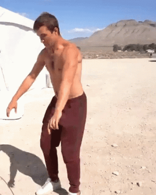 Perfect Backflip In The Sand GIF