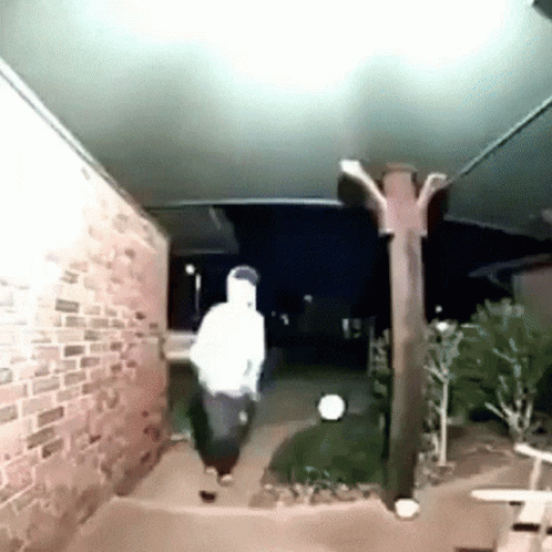 Performing Magic On Doorbell Camera Meme GIF