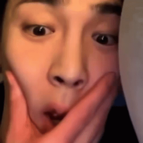 Person Covering Mouth With Finger