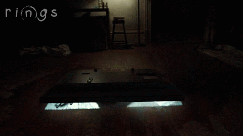 Person Crawling In Dark Room Saying Rings GIF