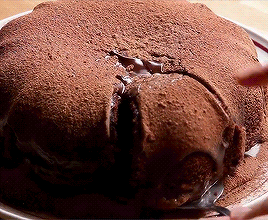 Person Cutting Chocolate Cake