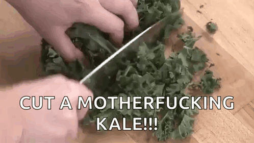 Person Cutting Kale with Knife