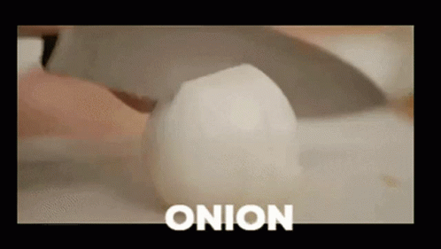 Person Cutting Onion