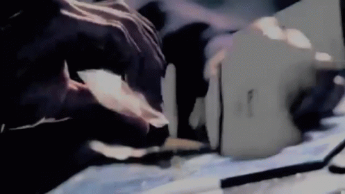 Person Cutting Paper With Knife