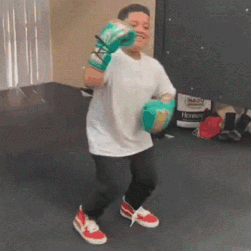 Person Dancing With Boxing Gloves