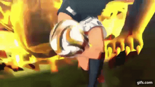 Person Doing Handstand with Soccer Ball and Fire