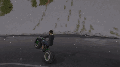 Person Doing Trick On Motorcycle On Road GIF