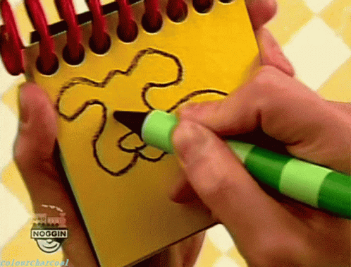 Person Drawing Flower On Notepad With Green Marker GIF
