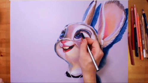 Person Drawing Rabbit With Brush