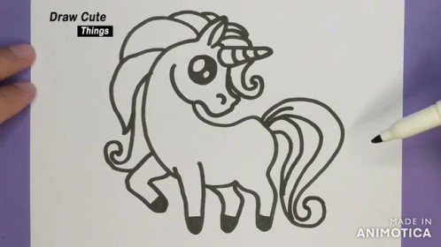 Person Drawing Unicorn With Marker