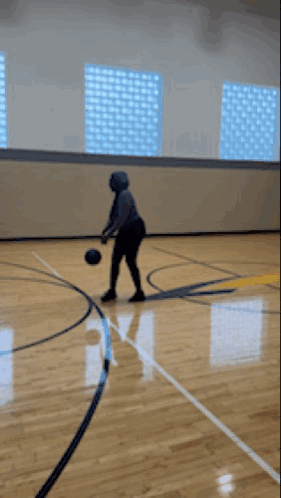 Person Dribbling Basketball GIF
