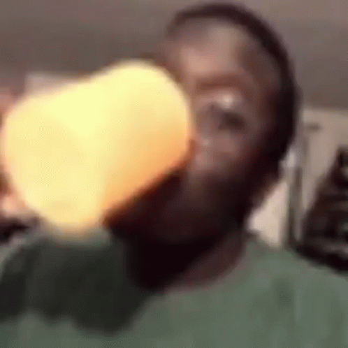 Person Drinking From Cup With Light