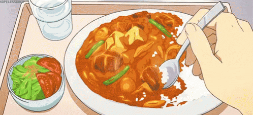 Person Eating Curry with Fork and Spoon