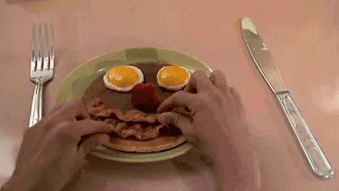 Person Eating Pancake Face With Eggs Bacon Strawberries GIF