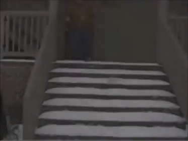 Person Falling Down Snowy Stairs